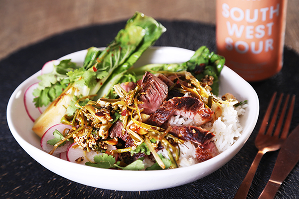 Steak with Sizzled Spicy Krunchilli Peanuts Seared Pak Choy and Jasmine Rice