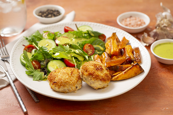 Garlic and Parmesan Stuffed Chicken Rissoles With Salad and Sweet Potato Fries