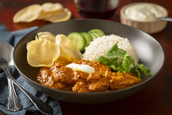 Chicken Tikka Masala with Fluffy Basmati Rice and Crunchy Pappadums