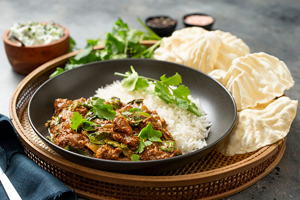 Quick and Easy Lamb Rogan Josh with Pappadams and Raita