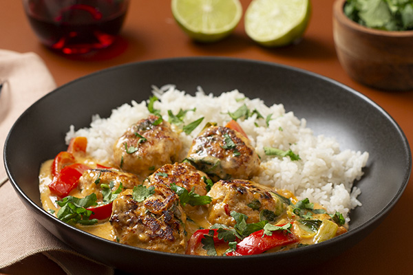 Thai Chicken Meatballs in Peanut Sauce with Coconut Rice