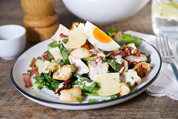 Chicken Caesar Salad with Croutons and Fried Egg